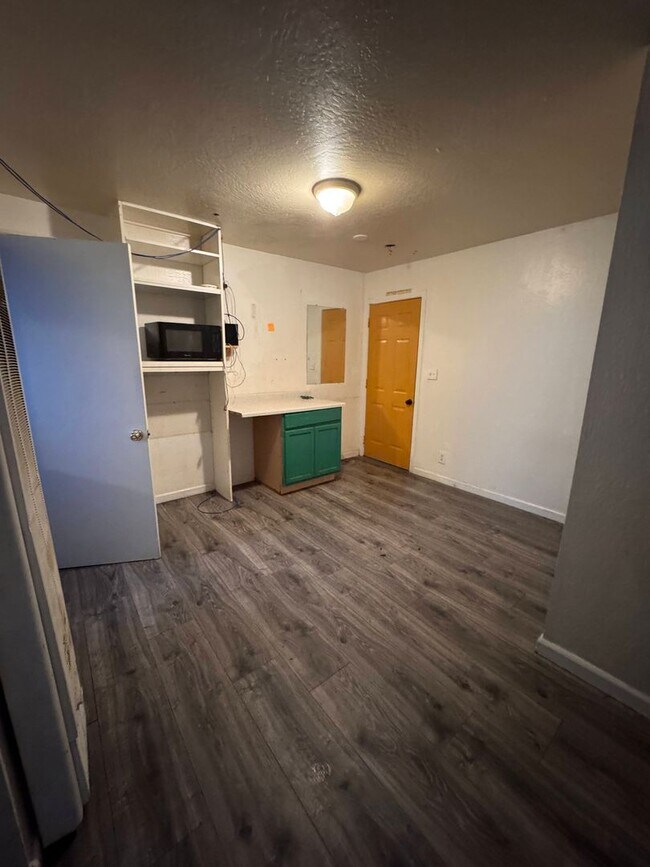 Building Photo - LONG-TERM RENTAL: Updated Studio with Shar...