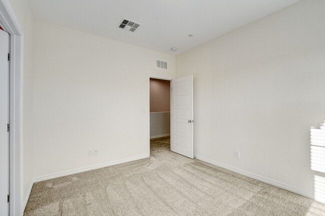 Building Photo - 4 Bedroom Townhouse in Tule Springs Coming Soon!