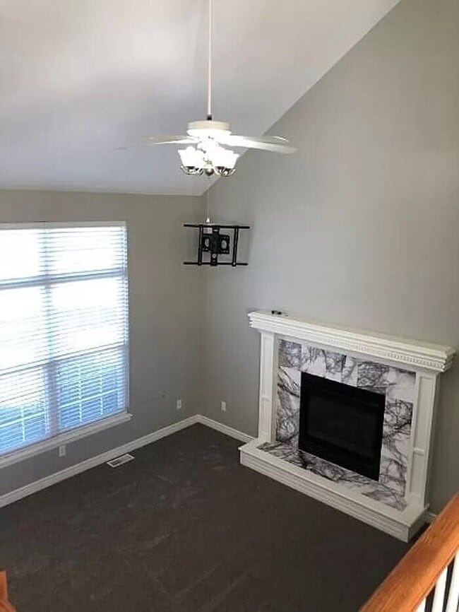 Building Photo - Spacious 4-Bedroom Greenwood Home with Vau...