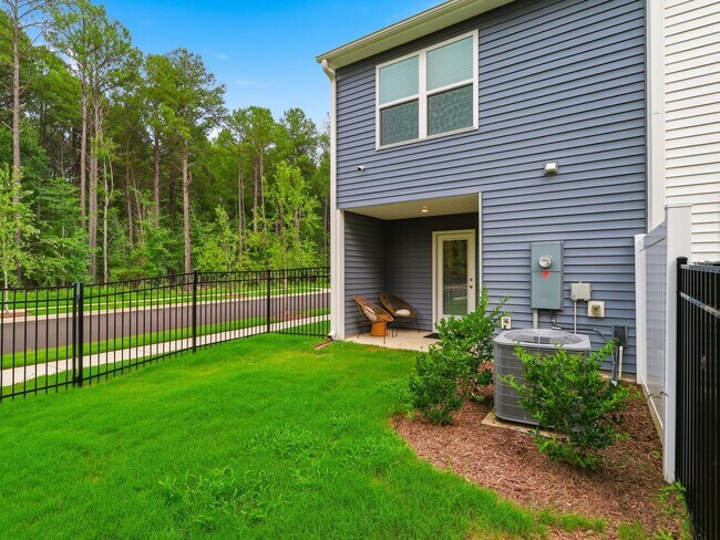 Building Photo - Newly Built 3BD, 2.5BA End Unit Raleigh Townhome with a Fenced Yard in a Prime Location