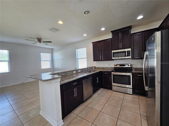 Building Photo - 7127 Nightshade Dr