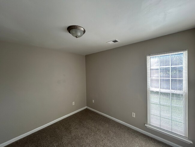 Building Photo - Spacious 4BR/2BA Olive Branch Home | 1,965 Sq Ft, Modern Fireplace, Bay Window & 2-Car Garage