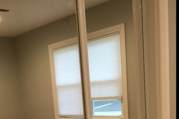 Front bedroom closet with sliding doors - 360 Staples St