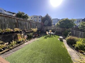 Building Photo - SPACIOUS  2BR + 1 BA WITH BONUS SUNROOM AND IN- UNIT LAUNDRY IN THE RICHMOND.