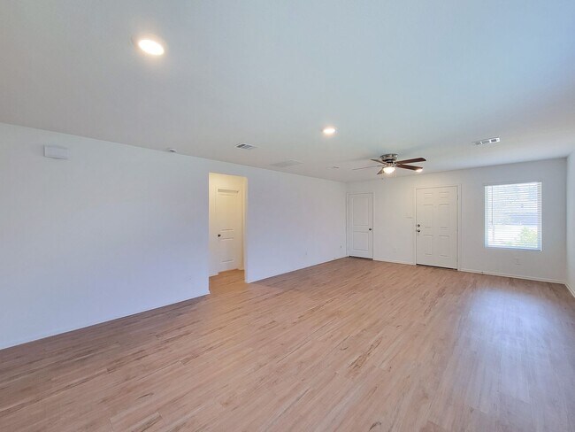 Building Photo - This single-story home has a comfortable layout with three bedrooms and a living area all on one ...