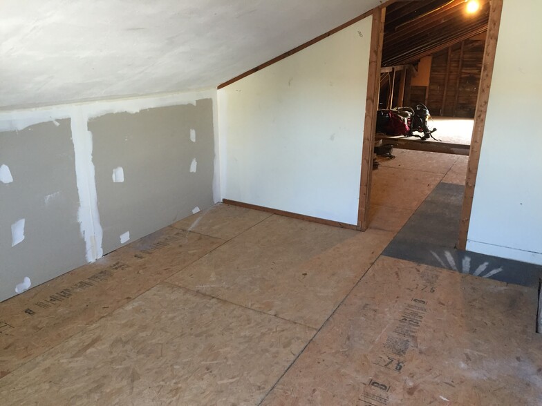Attic Storage -through living room - 338 E 8th St