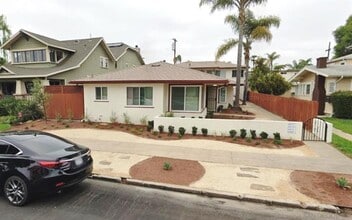 Building Photo - 2 BED 1 BATH Duplex Including 1 Car Garage in KENSINGTON