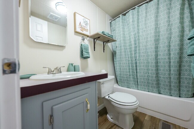 Building Photo - Cozy Fully Furnished 2-Bed with a Movie Ro...