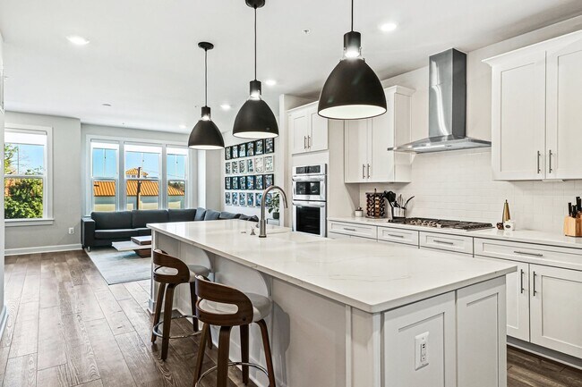 Building Photo - Your new home awaits you! Luxury Townhouse...