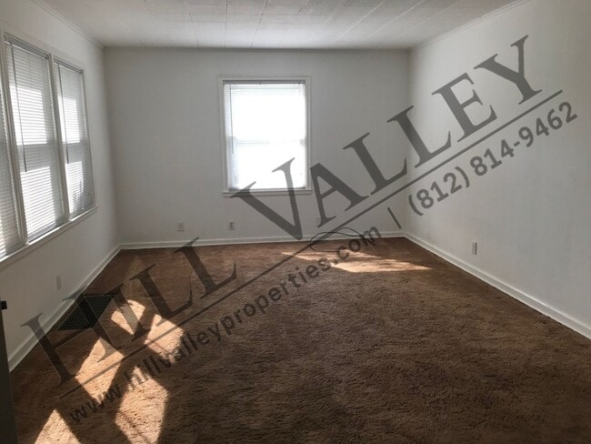Building Photo - Three bedroom, 1 1/2 bath - East