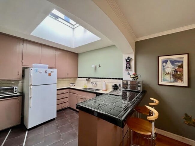 Building Photo - Whimsical 2BR/1BA, Outer Parkside Gem and Dog Friendly! FURNISHED Flexible Lease Term