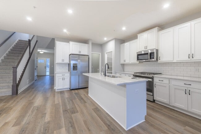 Building Photo - Awesome maple grove 5 bed 4 bath townhome! Pond views, 2 years old!