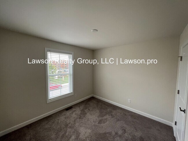 Building Photo - Upscale and Spacious Daleville Townhome