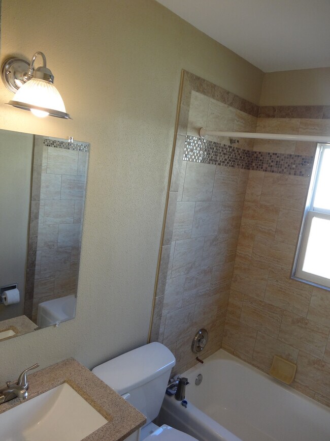 Building Photo - Three Bedrooms One Bathroom with Shaded Porch