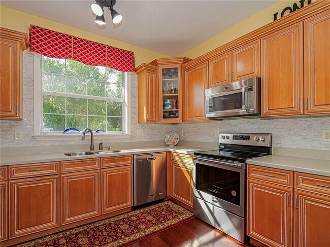 Building Photo - 5873 Pine Ridge Cir