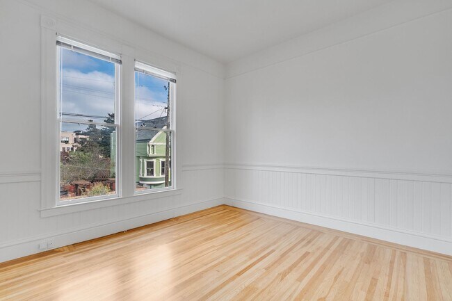 Building Photo - Remodeled pet friendly, top floor 2BR with in-unit laundry