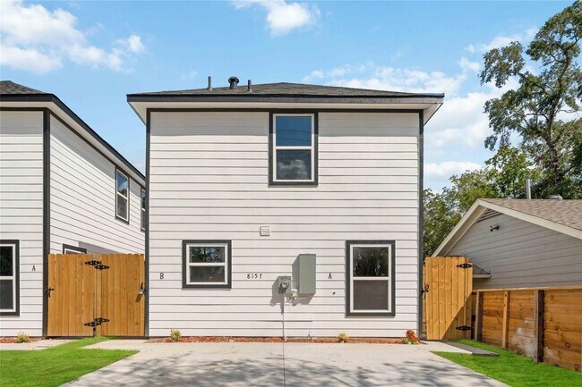 Building Photo - This newly constructed 3-bedroom, 2-bathroom unit offers modern living with 1,150 sq ft of space....