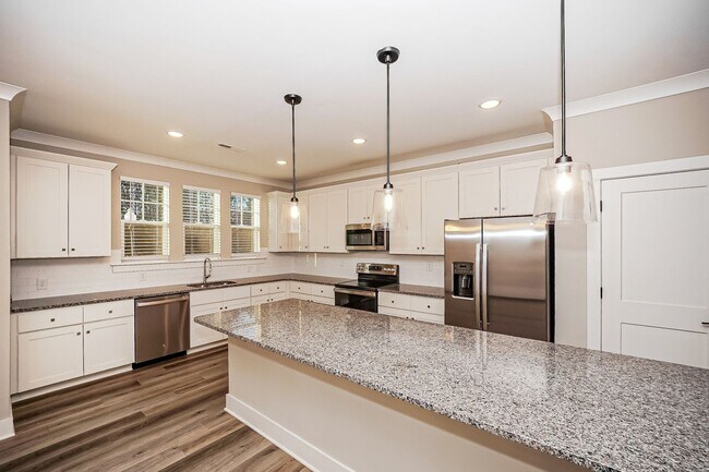 Building Photo - End-Unit Townhome w/3BR + 2-Car Garage + Balcony  - FIRST MONTH FREE