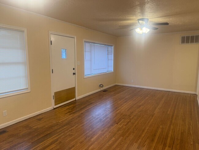 Building Photo - Step into this beautifully updated 1950's gem, where charm meets modern convenience