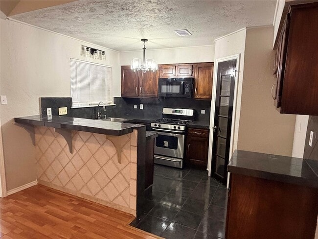Building Photo - 7111 Feather Creek Dr