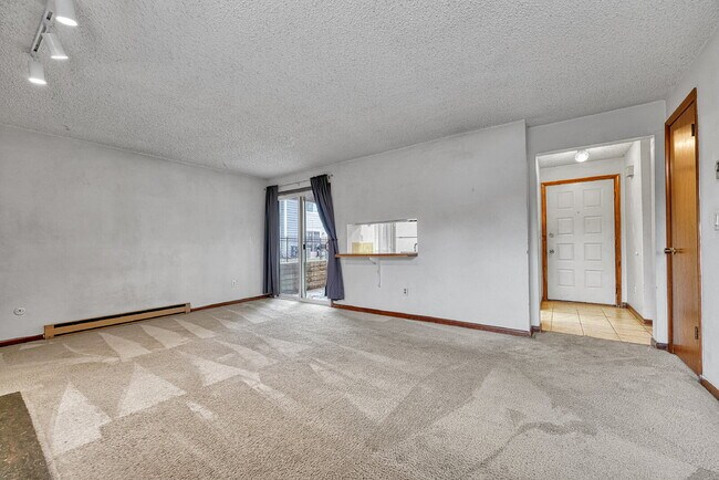 Building Photo - $1,245.95, 1 bed, 1 bath, garden level Condo with Washer/Dryer