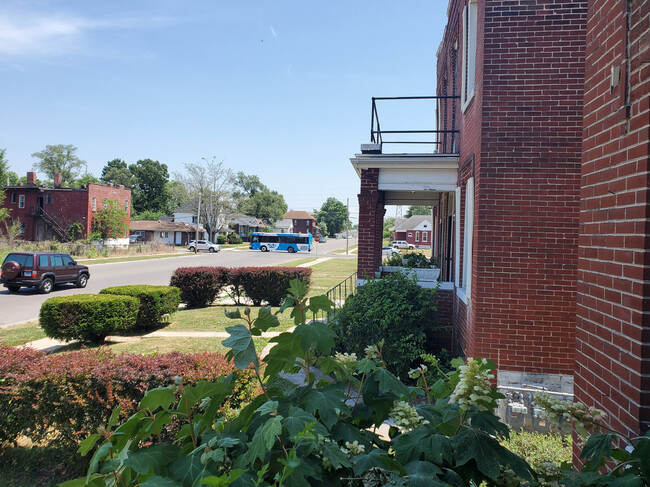 Bus stop at corner - 1730 Saint Louis Ave