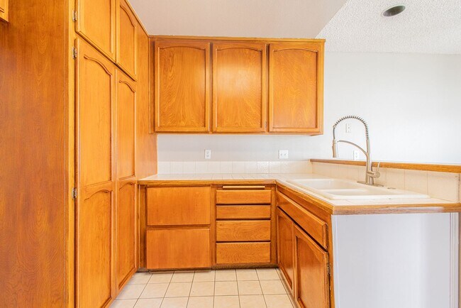 Building Photo - Spacious Single-Story 3-Bedroom Condo with Private Patio and 2-Car Garage