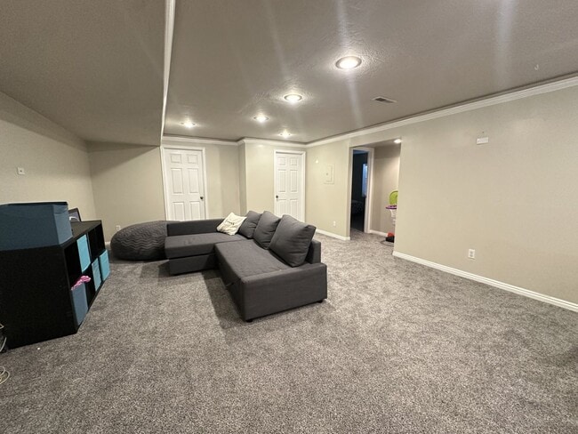 Building Photo - Large 4 bedroom end unit with fully fenced yard is a must see!!