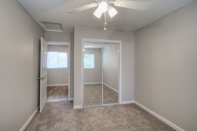 Building Photo - Greenwood Estates has an Excellent 2 Bedroom, 1.5 Bath Townhouse with a Backyard and Garage!