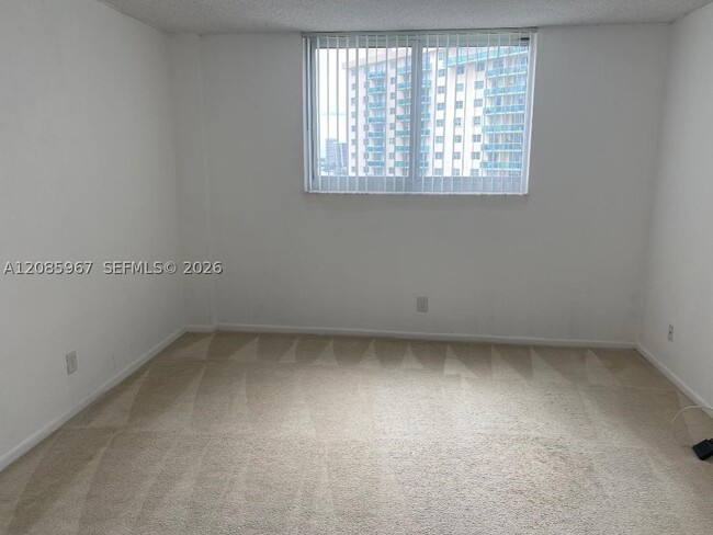 Building Photo - 19380 Collins Ave
