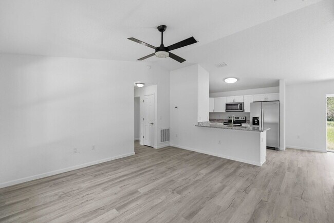 Building Photo - Available Now! New 3/2 Home with Large Backyard and Front Porch
