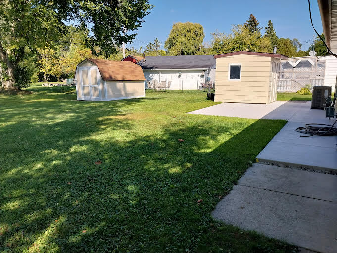 Two freshly painted sheds with new patio - 10506 Caddy Ln