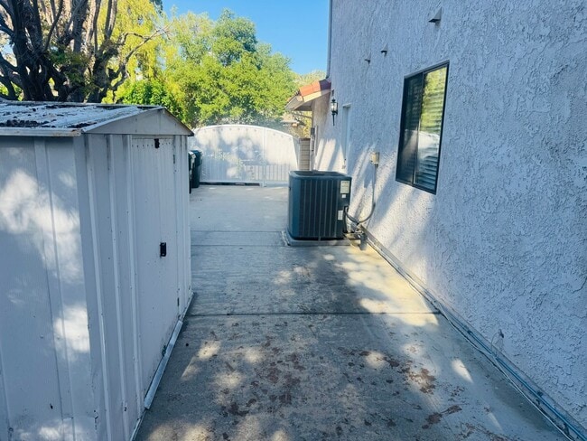 Building Photo - Beautifully Remodeled Lang Ranch Home – Steps from Top-Rated School