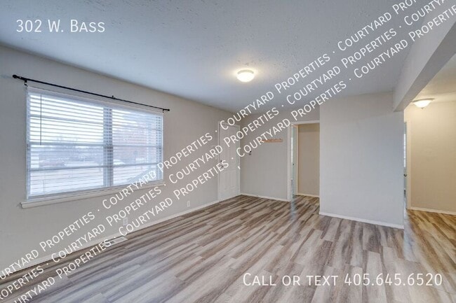 Building Photo - 302 W. Bass-