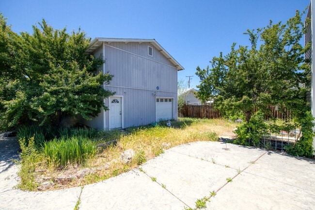 Building Photo - One Story Home with Large Detached Garage too