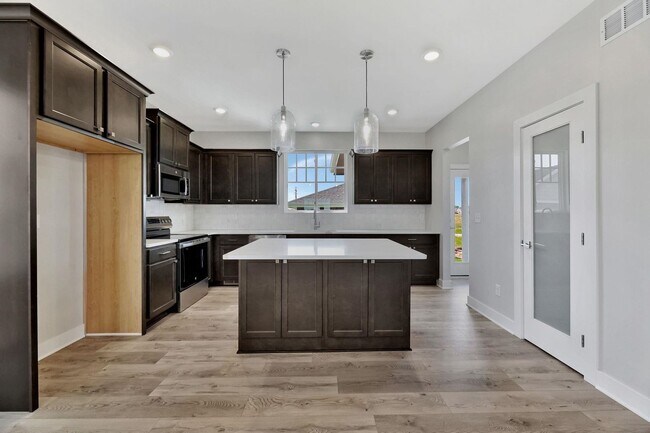 Building Photo - Spacious 3-Bed Home in Maize Schools – Roo...
