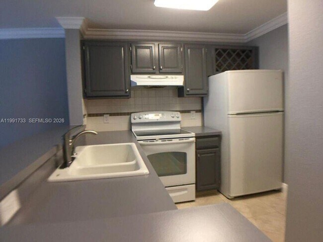 Building Photo - 1780 Palm Cove Blvd