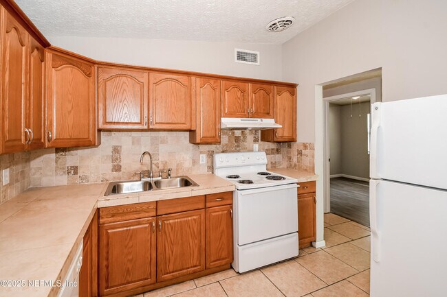 Building Photo - 6703 Cherbourg Ave N