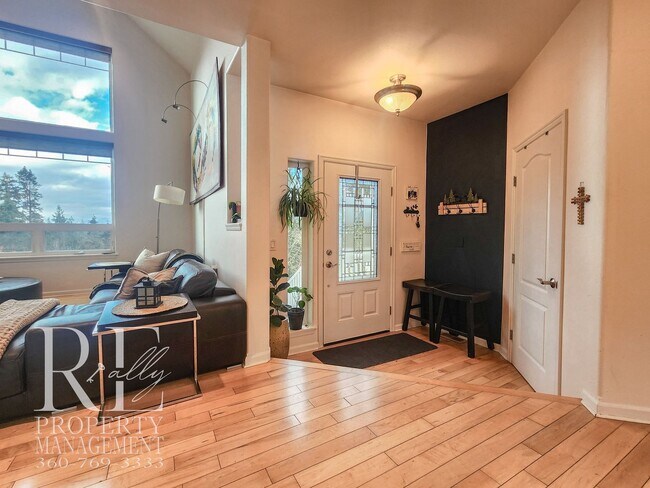 Building Photo - Light-Filled View Home with Vaulted Ceilings & Warm Wood Finishes