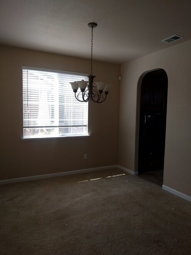 Building Photo - Gated Community Stunner ready to be called...