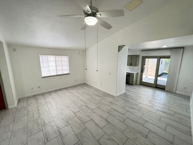 Building Photo - This inviting single-story home boasts a s...
