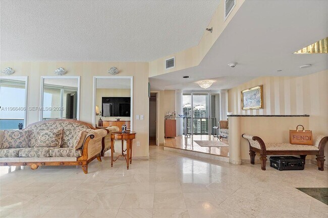 Building Photo - 16445 Collins Ave