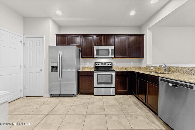 Building Photo - 6791 Roundleaf Dr