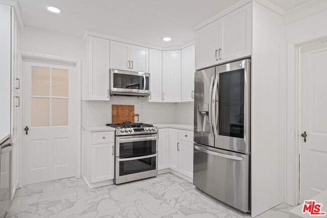 Building Photo - 10527 Le Conte Ave