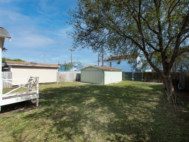 Building Photo - 5111 Ave Q 1/2