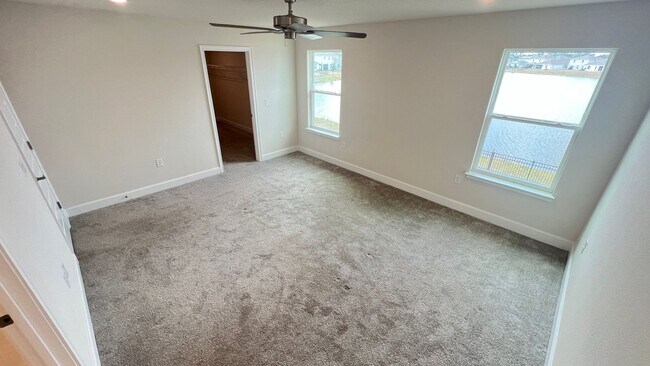 Building Photo - Beautiful Harmony Central Water Front Home AVAILABLE NOW!