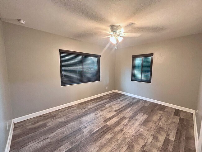 Building Photo - Renovated Home with Open Layout and Prime ...