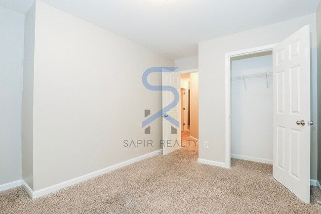 Building Photo - Move in before February 15th and choose your reward: a $250 Amazon Gift Card or a 55" Smart TV!