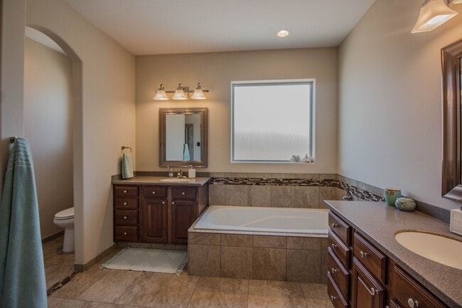 Building Photo - Spacious, Charming Home