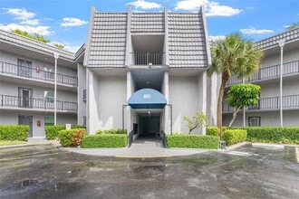 Building Photo - 9091 Lime Bay Blvd